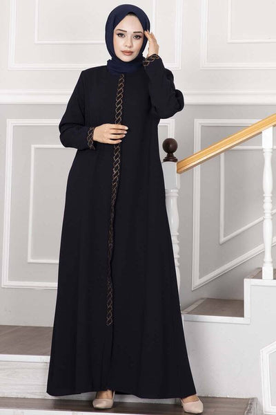 Abaya med steiner foran mørkeblå - Shams.no